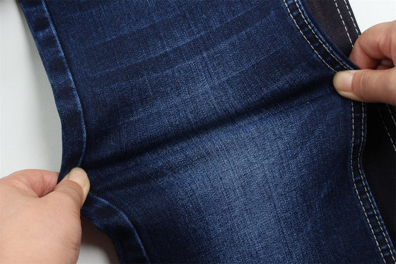 Buen precio 11-11.5 Oz Warp slub jeans de tela para hombre jeans mercerizados Vello negro trasero alto estiramiento para hombre estilo de mercado de la India en línea