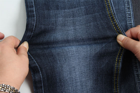 Buen precio 11.8-12 Oz Warp Slub Jeans Tejido Para Hombre Jeans Bajo Estiramiento Para Hombre India Mercado Estilo China fábrica en Guangdong en línea