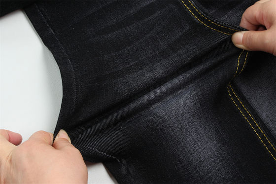 Buen precio 11 Oz Warp Slub Tejido negro de denim para hombre Jeans de estiramiento alto India estilo de mercado Venta caliente en línea