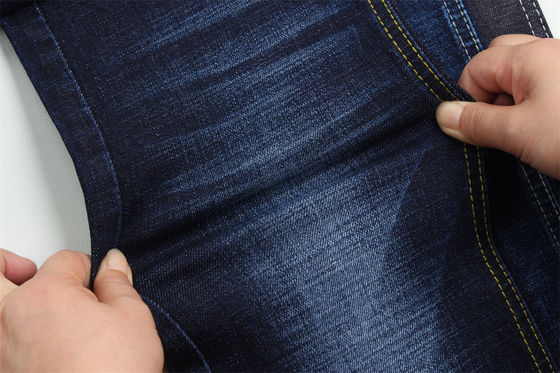Buen precio 11.8 Oz Cross Slub de algodón mezclado Spandex Blue Denim Tejido Para Hombre Jeans Estiramiento Estilo de mercado de la India Desizing Fleecing en línea