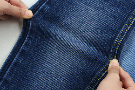 Buen precio 12 oz de jeans de hombre con estiramiento bajo de tejido de denim para el invierno jeans de estilo áspero en línea