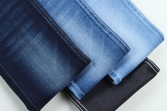 Buen precio 10 Oz Super Estiramiento Tejido De Denim Para Hombre De Verano Jeans Algodón Poliéster Rayón Spandex Rugoso Y Salvaje en línea