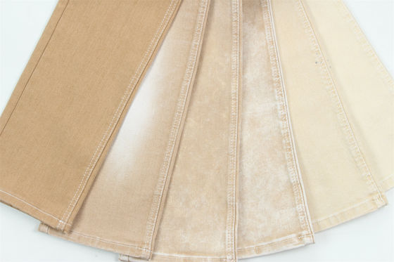Buen precio Tejido de denim de color kaki de alto estiramiento para vaqueros de dama en línea
