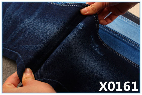 Buen precio Tejido de denim de color azul índigo de alto estiramiento para jeans en línea