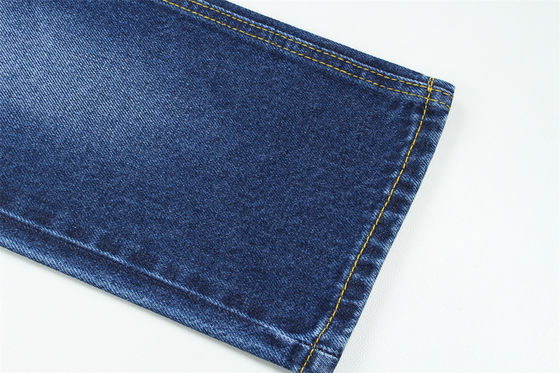 Buen precio 11.5 oz de tejido de denim rígido 100% C para el estilo de la marca Jeans estilo amigo del chico suave palpación Super color azul oscuro en línea