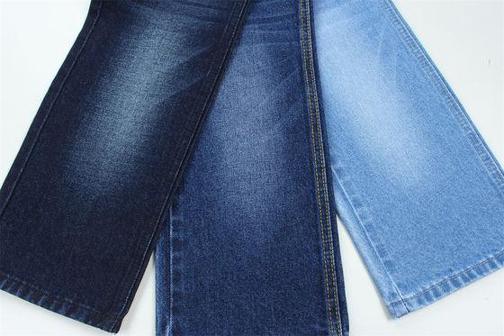 Buen precio 11.5 oz de tejido de denim rígido 100% C para el estilo de la marca Jeans estilo amigo del chico suave palpación Super color azul oscuro en línea