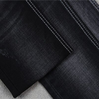 Buen precio Jeans de estiramiento de peso de tejido negro oscuro 10 oz Jeans de piernas delgadas de alta calidad en línea
