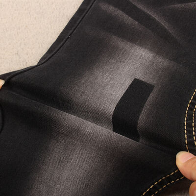 Buen precio Suministro de telas vaqueras para jeans de mujer de color negro azufre de alta elasticidad a precios de fábrica en 9.5OZ en línea