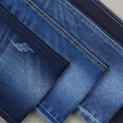 Buen precio Venta caliente 10,5 oz de algodón poliéster estiramiento jeans denim Tejido para hombres jeans en línea