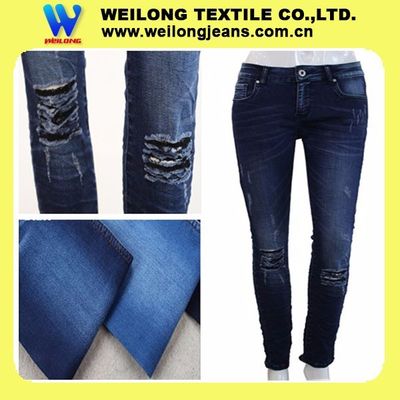 Buen precio Tela Jean Fabric material del dril de algodón del peso del verano de los vaqueros de 8,5 mujeres elegantes de la onza en línea