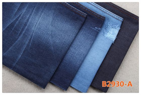 Buen precio 11oz que mercerizan marcan con rayitas cruzadas el material orgánico de las bragas de los vaqueros del verano de la tela del tejano de algodón en línea