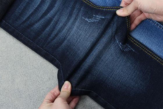 Buen precio Indigo Azul Cruzado Denim Tejido Slub Estiramiento Completo 10.3 Una vez que los materiales de los jeans en línea